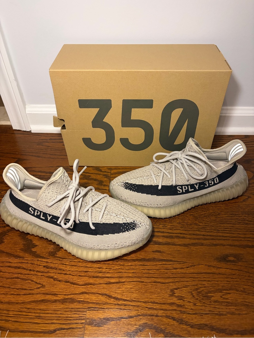 Yeezy Cream and Black Stripe Sneakers